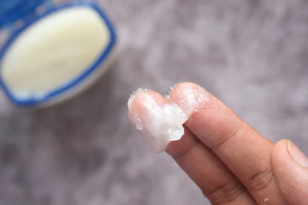 Petroleum Jelly on the finger