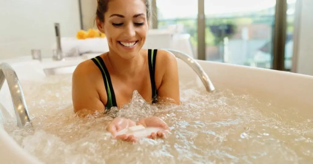 Women inside the jetted tub with epsom salt